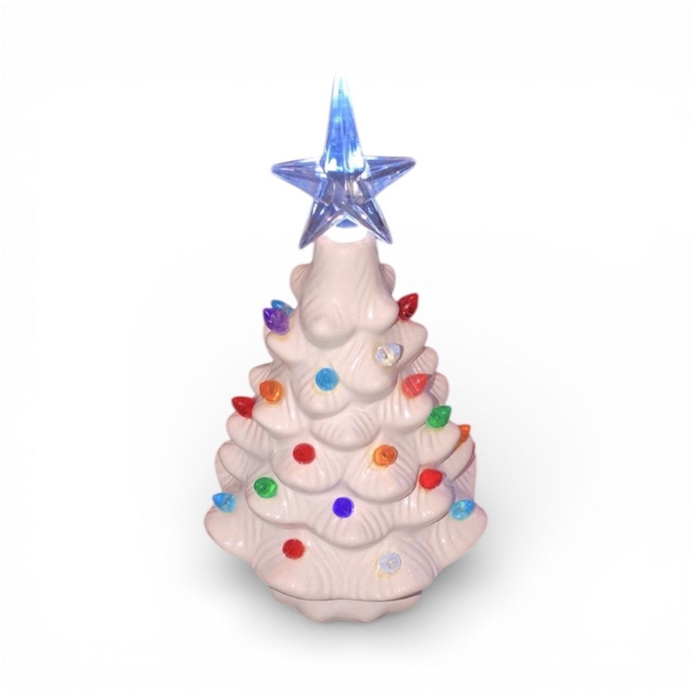 Small ceramic white Christmas tree that lights up